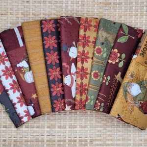 May include: A collection of 10 fabric squares featuring a variety of Christmas-themed patterns. The patterns include snowmen, reindeer, poinsettias, and a Santa Claus. The fabrics are in shades of red, green, brown, and gold.