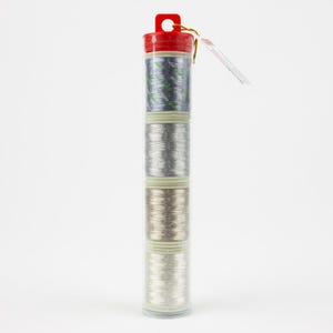 May include: A set of three spools of metallic thread in a clear plastic tube with a red lid. The thread colors are silver, gold, and white.