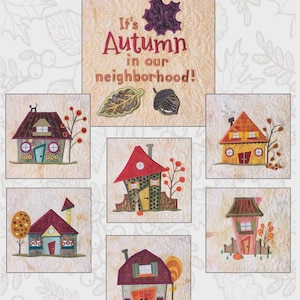 May include: A fabric panel featuring six whimsical house designs with autumn themes. The phrase "It's Autumn in our neighborhood!" is displayed above the houses. The panel includes the text "The Wonky Houses".