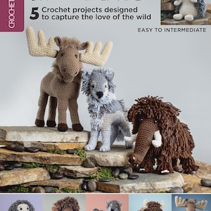May include: A book cover titled "IN THE WILD" featuring crochet projects. The cover displays a moose, wolf, and mammoth crochet animals. The text reads "5 Crochet projects designed to capture the love of the wild".