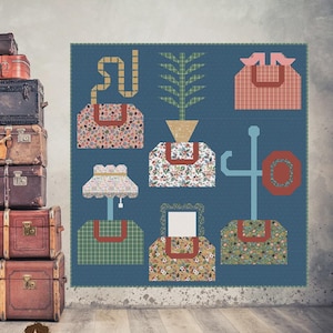 May include: A quilt pattern titled "CARPET BAGS" featuring a blue background with various bag-shaped designs in floral and plaid patterns. The finished size is 85.5" x 88". The pattern is by Sew a Story.