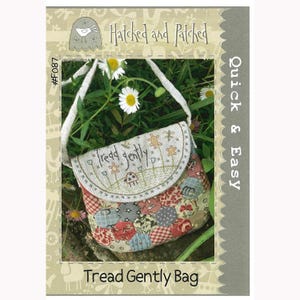 May include: A cross stitch pattern for a small bag with a patchwork design. The bag is called "Tread Gently Bag" and the pattern is from Hatched and Patched.