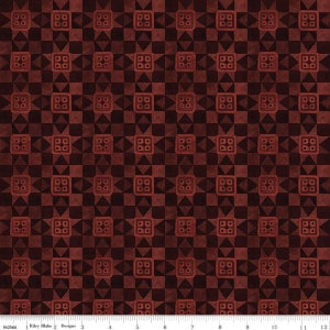 May include: Red and black geometric pattern fabric with a repeating design of squares and triangles.
