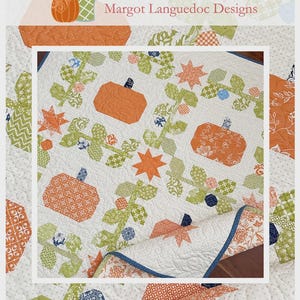 May include: A quilt featuring a pumpkin patch pattern with orange pumpkins, green vines, and star shapes on a white background. The text The Pattern Basket, Margot Languedoc Designs, and Pumpkin Patch www.thepatternbasket.com are visible.