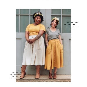 May include: Two women wearing yellow and gray t-shirts and button-down skirts. One skirt is cream-colored, the other is mustard yellow. The text "SEW LIBERATED" and "ESTUARY SKIRT" are also visible.