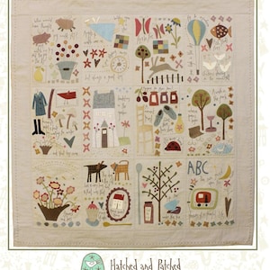 May include: A colorful patchwork quilt design featuring a variety of whimsical scenes, including dancing chickens, flying pigs, a house with a red roof, a dog, a tree, and a red ladybug. The quilt is titled "Dancing Chickens & Flying Pigs" and is by Hatched and Patched.