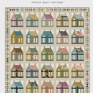 May include: A patchwork quilt pattern titled "Patchwork House" by Laundry Basket Quilts. The quilt design features rows of colorful house blocks with various patterns and colors. Quilt size is 71" x 78.5".
