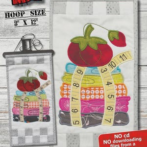 May include: Machine embroidery pattern with a stack of colorful fabric squares topped with a tomato and measuring tape design. The finished size is 6.5 x 12.25 inches. The hoop size is 8 x 12 inches. The text reads "Sew Necessary".