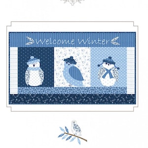 May include: A blue and white quilt block with the text "Welcome Winter" and three owls wearing winter hats. The owls are surrounded by a blue and white floral pattern. Below the quilt block is a white owl perched on a branch with the text "Snow Birds".