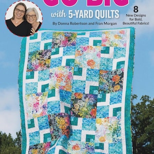 May include: A quilt pattern book titled Go Big with 5-Yard Quilts by Donna Robertson and Fran Morgan, featuring a colorful patchwork quilt with floral and geometric patterns in shades of blue, teal, white, orange, and pink on the cover.