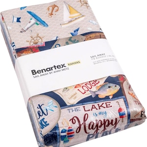 May include: A fabric bundle featuring a nautical theme with a sailboat, lighthouse, and anchor. The fabric is printed with the text "The Lake is my Happy Place" and "Lodge Established 1997".