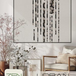 May include: Abstract wall art with a black frame. The artwork features vertical stripes in black and white, with a patterned design. The image also includes a chair, plants, and the text "ZEN CHIC" and "URBAN GRID".