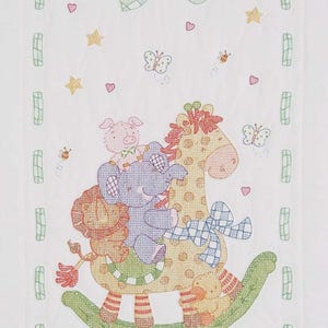 May include: A white baby blanket with an embroidered design featuring a giraffe rocking horse. The giraffe has a yellow body with brown spots. Other animals include a lion, elephant, and pig. Butterflies, stars, and hearts are also embroidered.