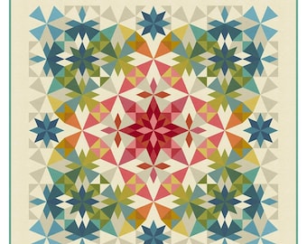 May include: A colorful quilt pattern titled "Alaska Rainbow" with a geometric starburst design. The quilt features a cream background with a central red star and surrounding stars in shades of pink, orange, blue, green, and yellow. The quilt size is 71.5" x 71.5".