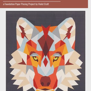 May include: A geometric quilt featuring a wolf's face, with a design of orange, red, cream, and blue triangles on a dark gray background. The text at the top reads "the WOLF ABSTRACTIONS quilt". The quilt is a Foundation Paper Piecing Project by Violet Craft.