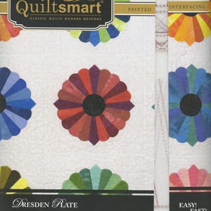 May include: A white fabric with colorful floral designs and the text "Quiltsmart" in a black frame. The image also includes the text "Dresden Plate" and "Easy! Fast! Smart!"