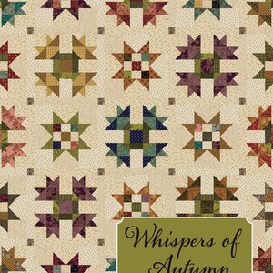 May include: A patchwork quilt featuring star-shaped blocks in various colors, including burgundy, green, and gold, set against a cream background. The quilt has a repeating pattern of the star blocks. The text "Whispers of Autumn" is displayed on a green label.