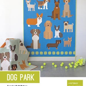 May include: A blue quilt featuring various dog breeds in a patchwork design. The quilt has a green border and is decorated with tennis balls. The image also shows a matching quilt and a sign that says "DOG PARK".