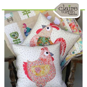 May include: Two decorative cushion patterns with instructions. The cushions feature a rooster design with red, pink, and yellow floral patterns on a white background. The text "Chooks" and "www.claireturpindesign.com" are visible.
