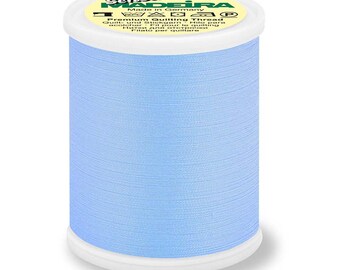 May include: A spool of light blue Madeira sewing thread. The label reads "Made in Germany" and "Premium Quilting Thread".