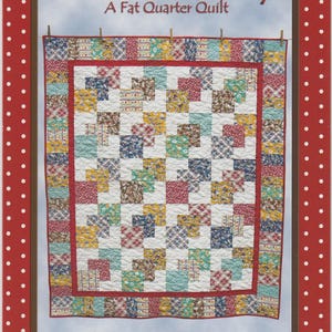May include: A quilt pattern book titled "Hanky Panky: A Fat Quarter Quilt." The cover features a colorful patchwork quilt design with squares of various patterns and colors, framed by a red border and a dotted red background.