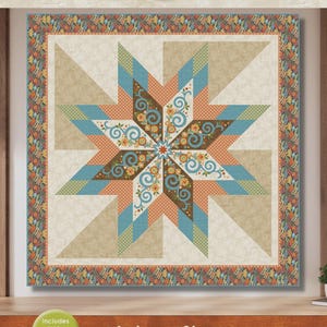 May include: A square quilt with a large star design, featuring shades of beige, orange, teal, and brown. The star's center has floral patterns. The quilt is framed with a patterned border and the text "Autumn Star" is displayed at the bottom.