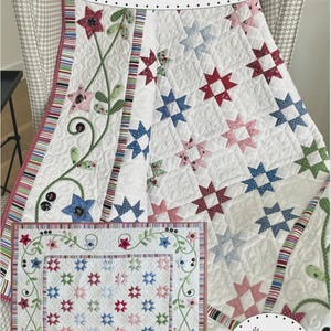 May include: A white quilt with a star pattern in red, blue, and pink. The quilt has a floral border and the text "Star Dance" and "Finished Size: 56" x 56". The quilt is designed by Jill Finley.