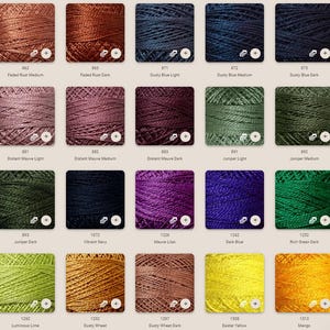 May include: A color chart of embroidery floss with 15 different colors, including faded rust, dusty blue, distant mauve, juniper, vibrant navy, mauve lilac, dark blue, rich green, luminous lime, dusty wheat, dusty wheat dark, easter yellow, and mango.