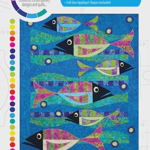 May include: A colorful quilt featuring a school of fish in shades of pink, green, blue, and purple. The finished size is 36" x 42". The quilt design includes the text "MOD FISH".