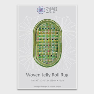 May include: A woven jelly roll rug with a patchwork design in shades of green, pink, and blue. The rug is oval-shaped and measures 49 inches by 28.5 inches. The text "Woven Jelly Roll Rug" is displayed below the rug.