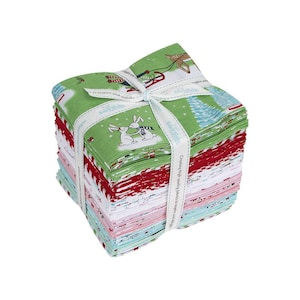 May include: A stack of 20 fabric squares in a variety of Christmas-themed prints, including red, green, white, and pink. The fabric squares are tied together with a red ribbon and feature a variety of designs, including snowflakes, reindeer, and Christmas trees. The fabric squares are labeled "Riley Blake Designs" and "Creating high-quality fabrics to inspire and delight."