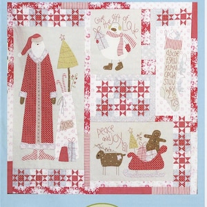 May include: A festive patchwork design with Christmas motifs, including Santa Claus, a snowman, and a gingerbread man. The design features the text "Christmas Blessings", "Give the gift of love", and "Peace and Joy to all". The design also includes the text "TOYS" and the alphabet.