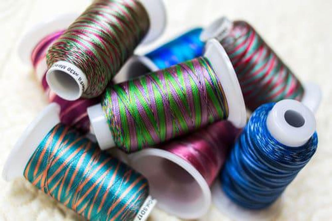 Swril Thread Mirage Spool Singles Thread | 800m 875yds 30wt Rayon | Wonderfil ...