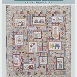 May include: A patchwork quilt titled "A Letter to my Daughter." The quilt features various fabric blocks with embroidered images of animals, houses, and text. The color palette includes shades of blue, pink, and beige.