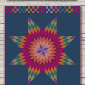 May include: A colorful quilt pattern featuring a large star design in shades of pink, orange, purple, and teal on a navy blue background. The quilt measures 66 x 78 inches. The text "Aglow CS" and "Nancy Rink Designs" are visible.