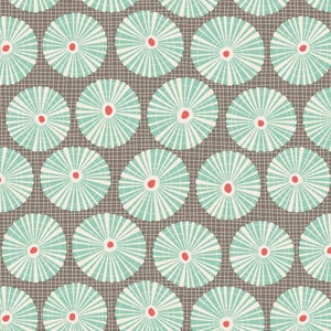 May include: A seamless pattern featuring teal blue and white circular designs with red centers on a brown background.
