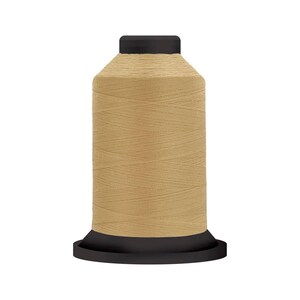 May include: A spool of beige thread with a black plastic bobbin.