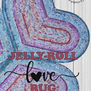 May include: Heart-shaped rug made from fabric strips in shades of blue, purple, and red. The rug has the text "JELLY-ROLL RUG" and "love RUG" in the image. The design is by RJ Designs.