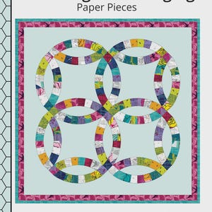 May include: A Four Ring Wall Hanging paper piecing pattern. The design features four interlocking rings with colorful fabric patches on a light blue background. The dimensions are 33" x 33". The pattern is labeled as intermediate.