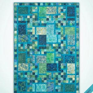 May include: A quilt pattern titled "Mouse Trap" by Hunter's Design Studio. The quilt features a patchwork design in shades of blue and green. The text "an easy-to-make quilt pattern in four sizes" is also visible.