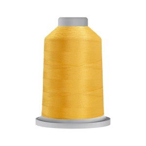 May include: A spool of bright yellow thread on a white plastic bobbin.