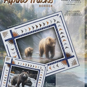 May include: A fabric panel with the text "Alpine Tracks Border" and images of bears in a river. The panel is framed with a geometric design in blue, white, and brown. The Riley Blake Designs logo is visible.