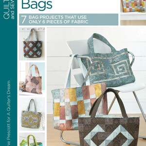 May include: A book cover titled "Fat Quarter Bags" with the text "Beginner Level." The cover features images of various fabric tote bags. The book is by Stephanie Prescott for A Quilter's Dream and includes 7 bag projects using only 6 pieces of fabric.