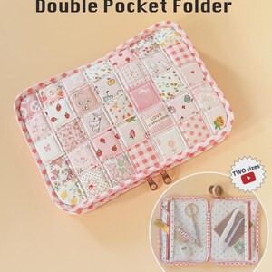 May include: A rectangular double pocket folder featuring a patchwork exterior with various pink, white, and floral patterns. The text "Double Pocket Folder" and "LOVE in every stitch" are visible. An inset shows the interior with mesh pockets.