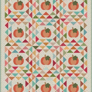 May include: A rectangular quilt featuring a repeating grid of twelve pumpkin blocks. Each pumpkin is orange with a green stem and leaf, surrounded by a border of multi-colored triangles in shades of red, teal, orange, and cream with various patterns.
