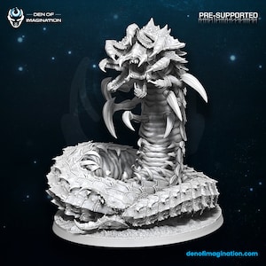 May include: A detailed, white 3D-printed model of a monstrous worm-like creature. The model features sharp teeth, claws, and segmented body armor. The text "DEN OF IMAGINATION" and "PRE-SUPPORTED" are visible.