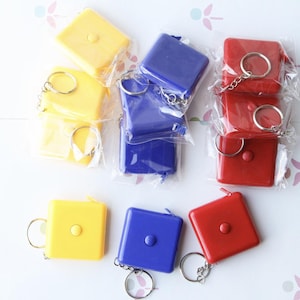 GRADE_B: Set of 12 Pocket Tape Measures – 150cm Metric Only – Sewing, Craft, Keyring – Factory Misprint Clearance
