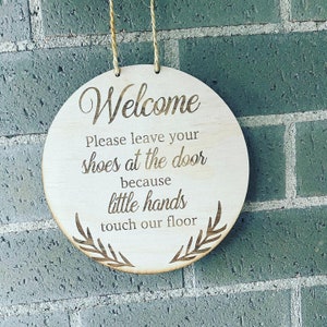 Welcome sign- shoes off