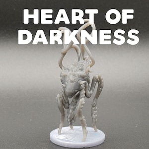 May include: A gray, detailed miniature figure of a creature with multiple spindly legs and tentacles. The creature has a spiky head and a textured body. The figure is standing on a round, light gray base. The text "HEART OF DARKNESS" is written in white letters above the figure.