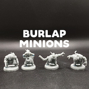May include: Four gray painted miniature figures of creatures with burlap sacks for bodies. The figures are standing on round bases. The text "Burlap Minions" is written in white letters on a black background.